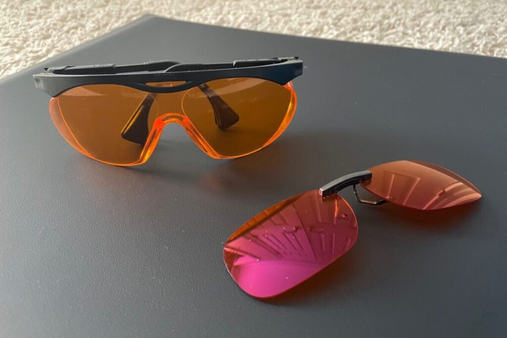 Amber-colored glasses and clip-on lenses